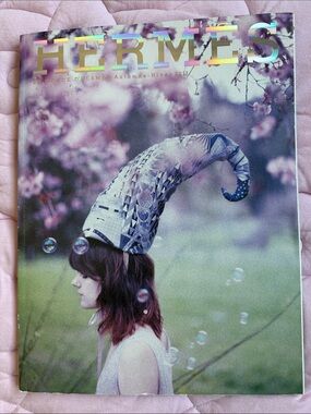 Hermes La Maison magazine cover in purple, pink, green